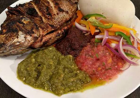Grilled Tilapia With Banku And Green Chilli Pepper Sauce