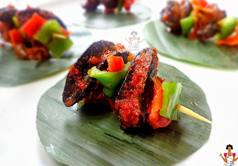 Spicy And Hot Snails On Skewers