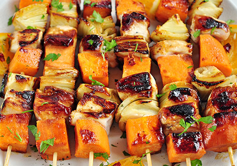 Sweet Potato With A Mixed Grill On A Skewer